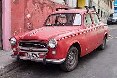 A Peugeot 403, from around 1958, on Calle San Miguel in Havana, Cuba.
