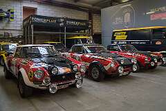 Three Fiat Abarth 124 Spider Rally Stradale, introduced in 1972, with extra lighting for rallies, in the main hall of the Abarth Works Museum , Belgium.