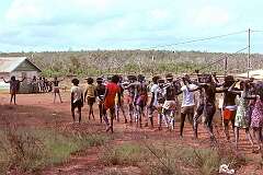 Galiwin'ku, NT, Australia, 1976 - Men brandishing spears during a burial ceremony on Elcho Island, off the Arnhem Land coast.