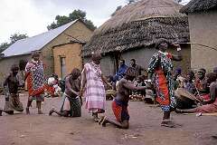 Bethany, Eswatini, 1972 - Candidate “tangoma”, traditional healers, walking on their knees as a sign of submission to ancestral spirits, in their “iNtfwasa” graduation ceremony.