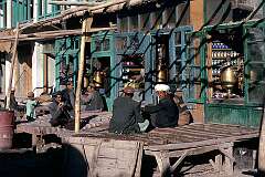 The "Chai kana", or tea house, is the favourite meeting place of the men where they sit on seating platforms outside, talk and drink endless small cups of tea.