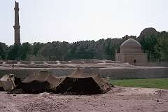 Tents of Kuchi nomads are perched near four broken minarets, all that remains of a “madrassa”, an Islamic religious school near Herat, destroyed by the British in 1834.