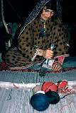 A woman of the nomadic Kuchi people at work making a beautiful woollen carpet for which they are justly famous. Her family had pitched their tent on the outskirts of Herat.