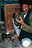 A silver smith in one of the many tiny workshops in Kandahar. Beautiful pieces are produced with simple tools.