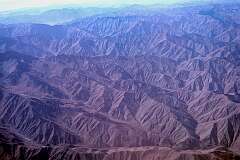 Above the Hindu Kush mountains.