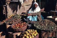 Waiting for customers in a market place in Mazar. There are orchards, producing good quality vegetables and fruits in this region.