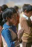 Saying prayers at the assembly at Lamdon Model School.