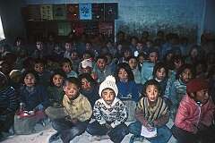 Tibetan children singing in class, keeping their language and culture alive in the SOS Tibetan Children's Village.