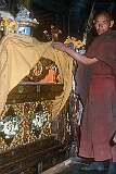 A monk showing the throne of the Dalai Lama in Thikse Gompa; he visited the monastery in 1970.