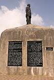 Captain Sievizo Seyie, a Naga warrior who was threatened with execution by the Indian army but eventually released, as his story on the monument shows. along the road from of Kohima to Khonoma.