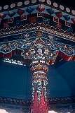 Detail of colourful woodcarving at the bandstand.
