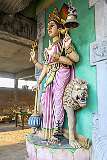 Kali statue in the Veeramma Kali temple; her association with the lion highlights her fierce and fearless nature: the vehicle of a divine being often represents its power and domain.
