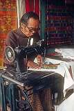 Making Tibetan-style bags at Raja Dorjee Market.