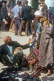 Selling shoes on the market in Aqqala.