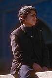 A boy on a wall in the city of Isfahan.