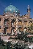 In the courtyard of the Goharshad (Gawhar Shad) Mosque, dating from 1418; it is the first and the greatest surviving, Persian monument of the fifteenth century and has served as a Friday Mosque for pilgrims to the shrine of Imam Reza, in Mashhad.