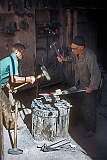 Working on a pickaxe in a smithy workshop in Tabriz.