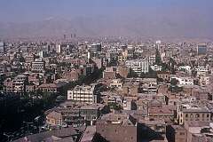 View along Ferdowsi Avenue, looking north, in central Tehran.
