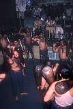 Men swinging “mils”, Indian clubs at Zurkhaneh. After the Revolution of 1978- 79, the authorities of the Islamic Republic have now barred women from attending the Zurkhane and athletes have been made to wear tee shirts.