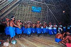 Singing and dancing with costume designs representing Halley's Comet, in the Maneaba “Te Nanoraoi” in Kuma village, in the north of Butaritari atoll.