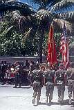 American Marines marching with their flags, at the ceremony commemorating the 45th anniversary of the Battle of Tarawa in Betio.