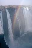 Rainbow Falls, with a rainbow in the afternoon, of “Mosi oa Tunya”,  Victoria Falls.