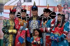 Darkhan, Mongolia, 2011 - Posing in traditional Mongolian “deel” costume at the Naadam Festival.