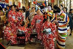 Nagasaki, Kyūshū, Japan, 2014 - Traditional Japanese dress in Hamamachi Arcade, at the Nagasaki Kunchi Festival.