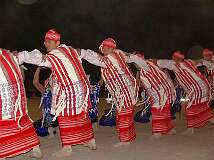 Taungale, Kayin State, Myanmar, 2006 - Karen men in a fast “don dance” at Karen New Year celebrations.