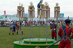 Darkhan, Mongolia, 2011 - Traditional Mongolian wrestling at the Naadam Festival.