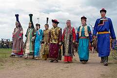Choibalsan, Dornod, Mongolia, 2011 - Mongolian costumes of different periods and regions, at the Naadam Festival.