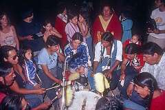 Wakapamni, South Dakota, USA, 1980 - Lakota (Sioux) Pass Creek Singers at a pow-wow.