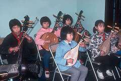 Shanghai, China, 1978 - Playing traditional Chinese instruments in the Children’s Palace.