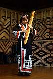 Shiraoi, Hokkaido, Japan, 2014 - Playing the “tonkori” of the Ainu people in Porotokotan.