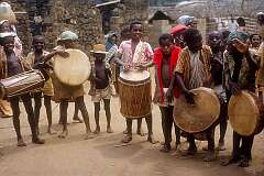 Chiconi, Mayotte, Comoro islands, 1972 - Boys drumming, awaiting the start of a ceremony.