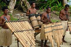 Uepi, Solomon Islands, 2009 - Playing bamboo pipes (“thong-o-phones”) by men from Toelegu Village, Isabel island.