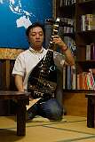 Nara, Honshu, Japan, 2014 - Singing and playing the “Biwa”.