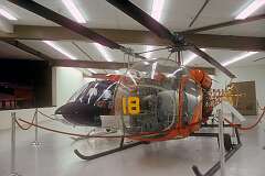 A Bell H-13 Sioux, the military versions of the Bell 47, a single-engine single-rotor light helicopter procured by the Navy between 1947 and 1958.
