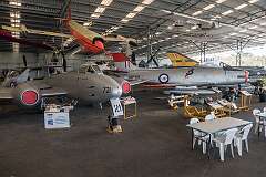 A Gloster Meteor F Mk.8, a CAC CA-27 Sabre, and overhead a GAF Jindivik radio-controlled target drone.