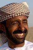 Abu Dhabi, United Arab Emirates, 2008 - A happy Desert Safari driver.