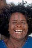 Port Moresby, Papua New Guinea, 1979 - A woman with tribal tattoos in Koki Market.
