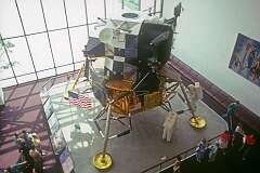 A display of the Apollo Lunar Module (LM) with the two astronauts on the surface of the moon.