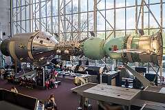 A mockup of the Apollo–Soyuz Test Project , conducted in July 1975, the first joint U.S.–Soviet space flight, as a symbol of the policy of détente that the two superpowers were pursuing at the time.
