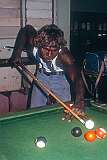 Lajamanu, NT, Australia, 1976 - A Warlpiri man playing pool.