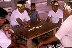 Vaitupu, Tuvalu, 1999 - Playing dominoes in the “maneapa” assembly hall.