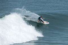 Sawtell, NSW, Australia, 2021 - Surfing at Bonville Headland.