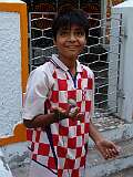 Yangon, Myanmar, 2007 - Spinning a top on his hand.