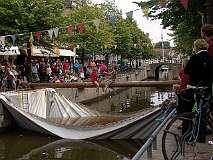 Harlingen, Fryslân, Netherlands, 2005 - "Boegspriet zakslaan", trying to knock each other off a greased ships's mast.