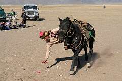 Sagsai, Bayan Ölgii, Mongolia, 2011 - “Tengge Ilu”, a Kazakh horse game: a rider at full gallop must pick up scraps of material (originally coins).