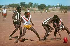 Lajamanu, NT, Australia, 1977 - AFL (Australian Rules Football) match: Lajamanu against Yuendumu.